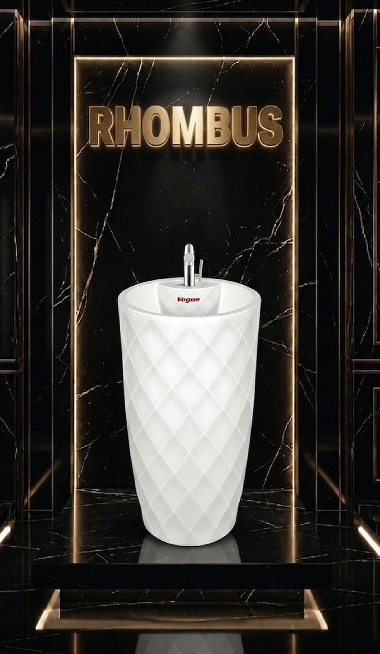 Rhombus free-standing basin with a diamond-quilted surface, against black marble
