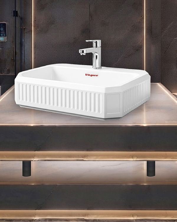 V-1100 fluted counter-top basin on a lit glass counter