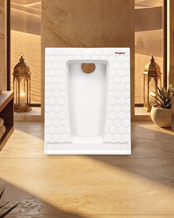 V-115 squatting pan with a honeycomb-textured surface